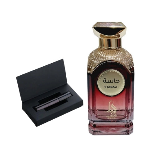 Botella de Al Absar Hasaa, uno de los mejores perfumes árabes, con un atomizador de viaje.
