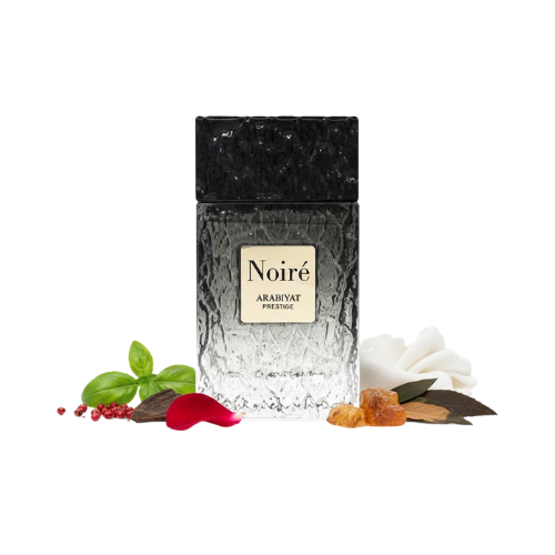 Detalle del frasco Noiré Arabiyat Prestige 100 ml con textura negra y placa central elegante de estilo premium