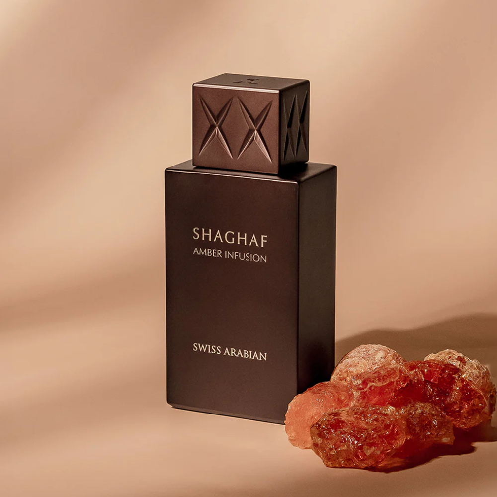 Perfume Shaghaf Amber Infusion de Swiss Arabian, fragancia de lujo con ámbar dorado, vainilla y maderas preciosas. Intensa, cálida y sofisticada